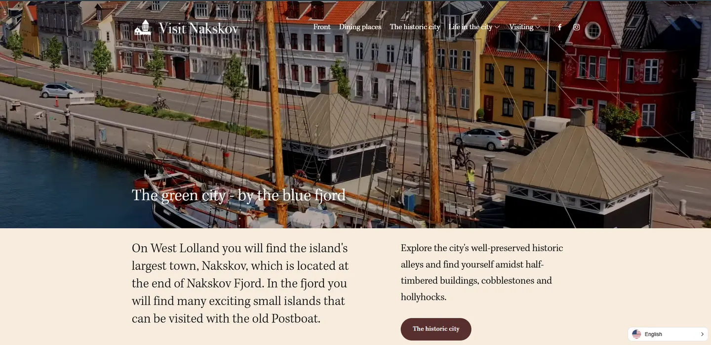 English version of visitnakskov.dk with the ConveyThis language switcher
